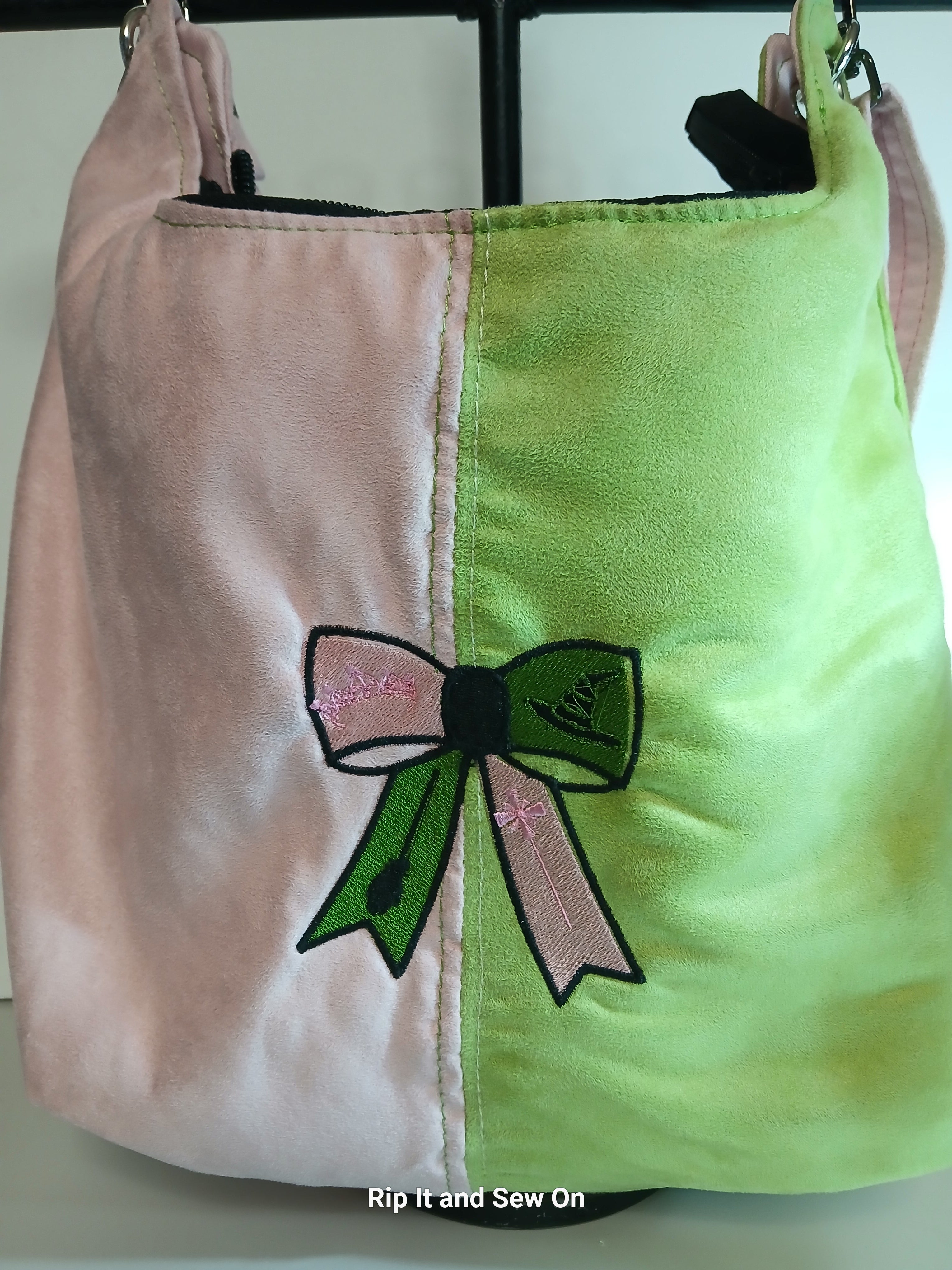 Wicked Bow embroidered hobo bag