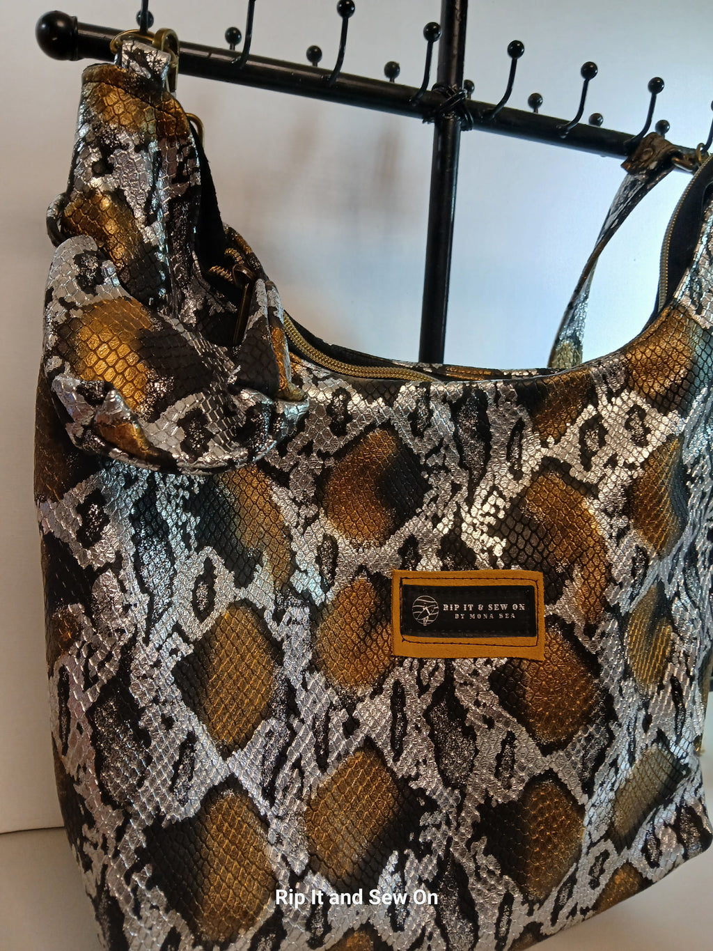 Leather snake hobo bag