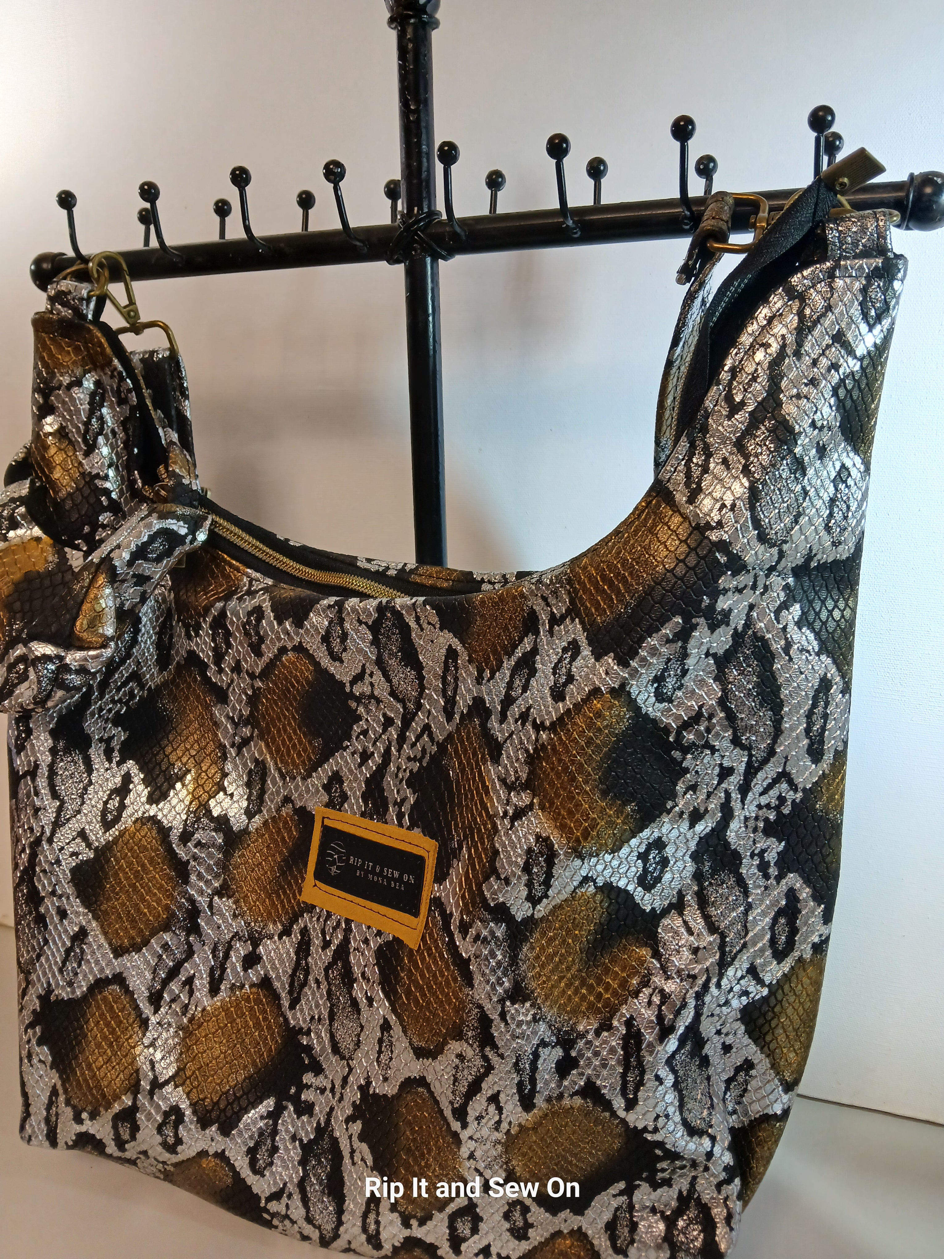 Leather snake hobo bag